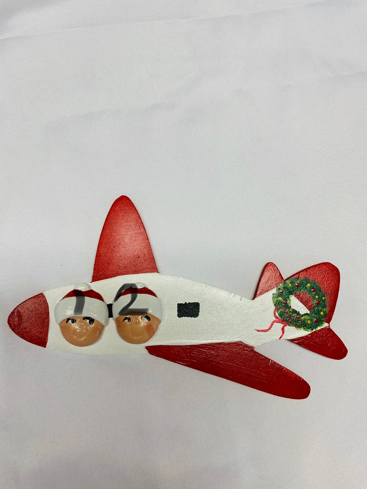 Airplane with 2 Santa Heads