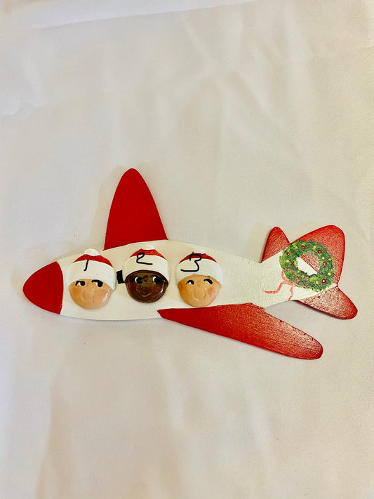 Airplane with 3 Santa Heads